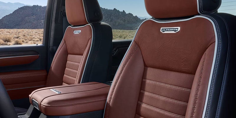 Leather front seats inside the 2026 GMC Sierra 2500 Denali.